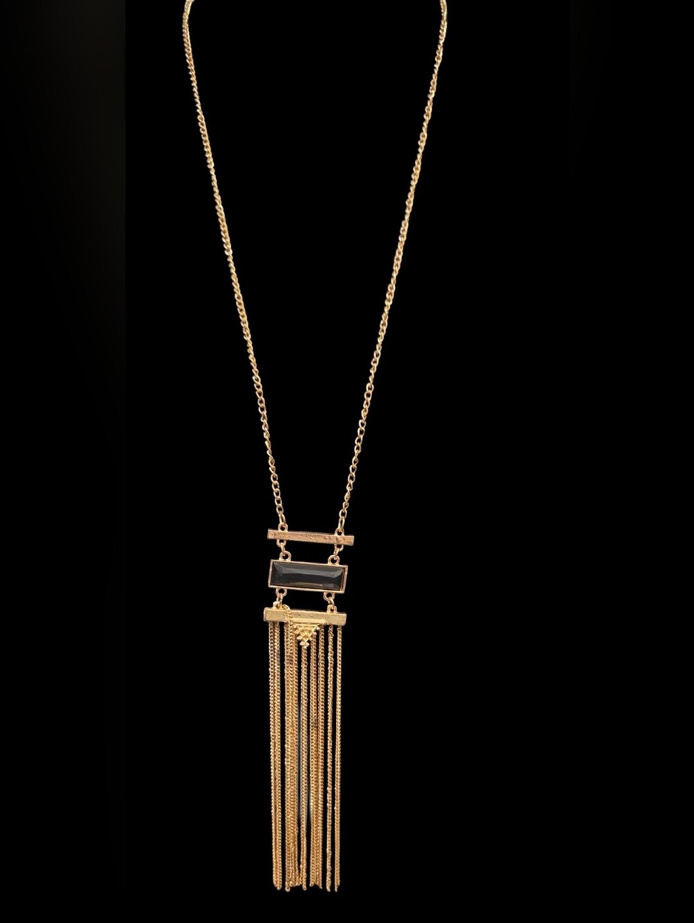 gold-tone necklace with a black glass pendant w/  multi-chain fringe